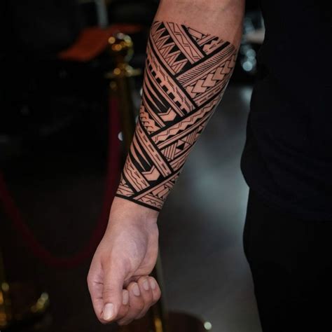 men forearm tribal tattoos|tribal arm sleeve tattoos.